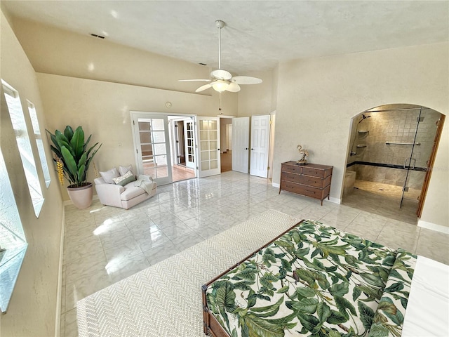 155 Avalon Ave, Flagler Beach, FL 32136 - bedroom featuring a high ceiling, french doors, ceiling fan, and ensuite bathroom