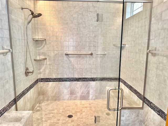 155 Avalon Ave, Flagler Beach, FL 32136 - bathroom featuring a shower with shower door