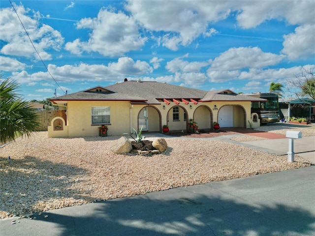155 Avalon Ave, Flagler Beach, FL 32136 - view of front of property with a garage