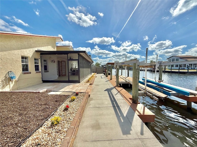 155 Avalon Ave, Flagler Beach, FL 32136 - dock area featuring a patio area and a water view
