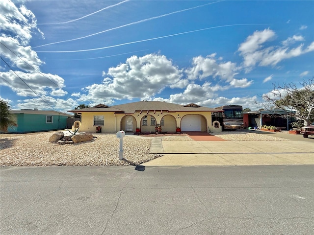 155 Avalon Ave, Flagler Beach, FL 32136 - view of front of home featuring a garage