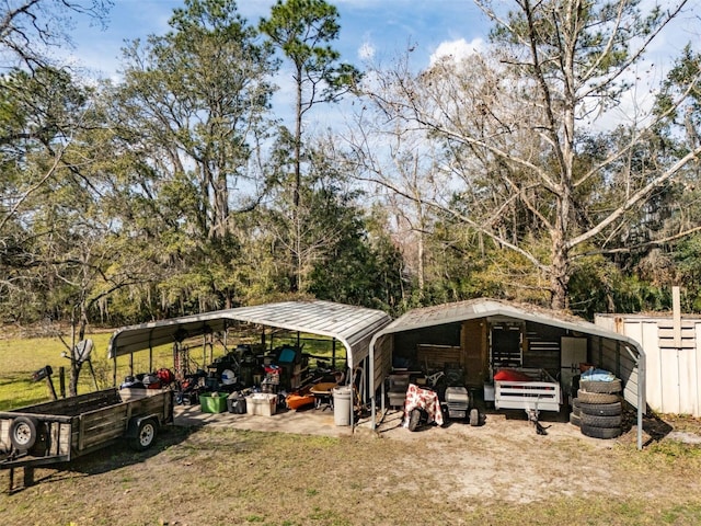 view of yard with a carport