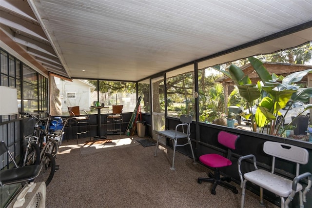 sunroom with plenty of natural light