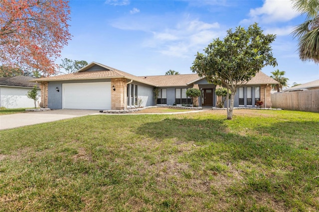 single story home featuring a garage, brick siding, fence, driveway, and a front yard