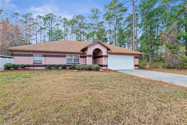 ranch-style home with a garage and a front yard