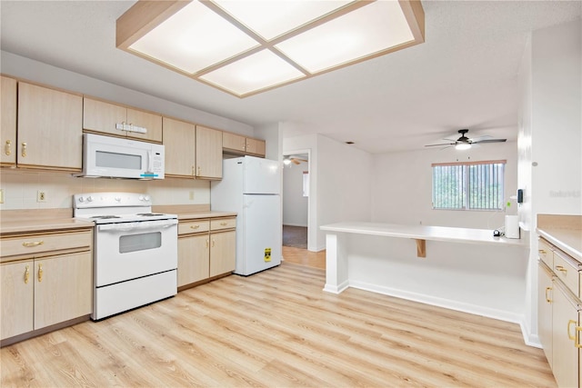 kitchen with light hardwood / wood-style flooring, light brown cabinets, ceiling fan, white appliances, and decorative backsplash