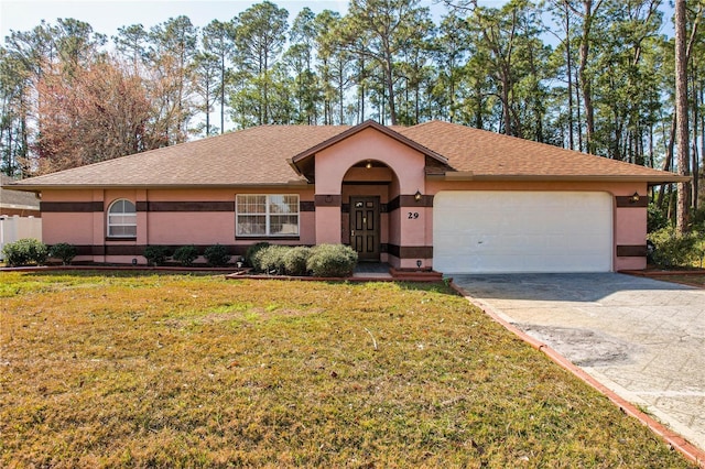 ranch-style home with a garage and a front lawn