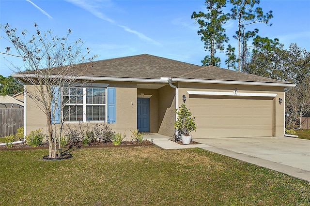 single story home featuring a garage and a front lawn