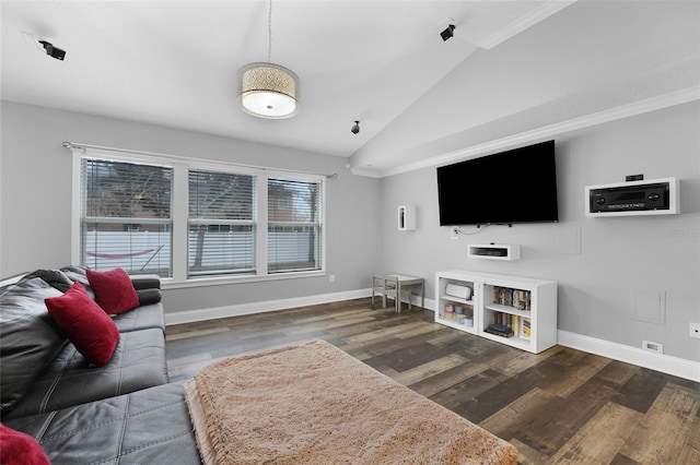 living room with dark hardwood / wood-style flooring and vaulted ceiling