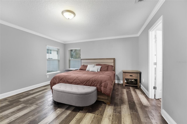 bedroom featuring crown molding, dark hardwood / wood-style floors, and a textured ceiling