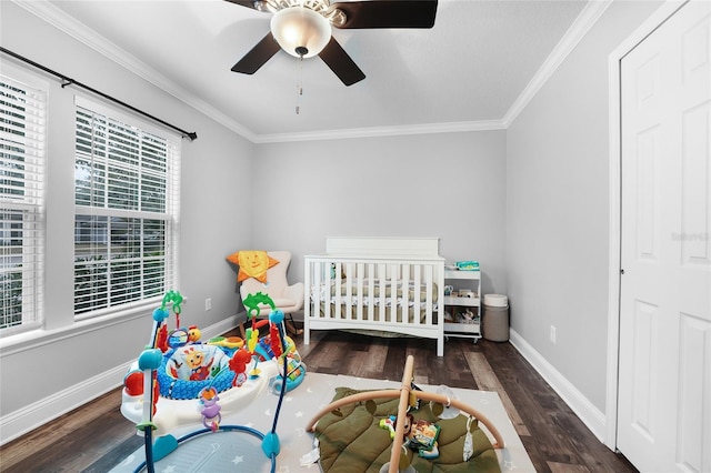 bedroom featuring ceiling fan, ornamental molding, and dark hardwood / wood-style floors