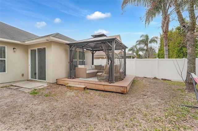 view of yard featuring a gazebo and a deck