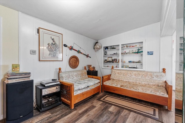 sitting room featuring dark wood-style floors