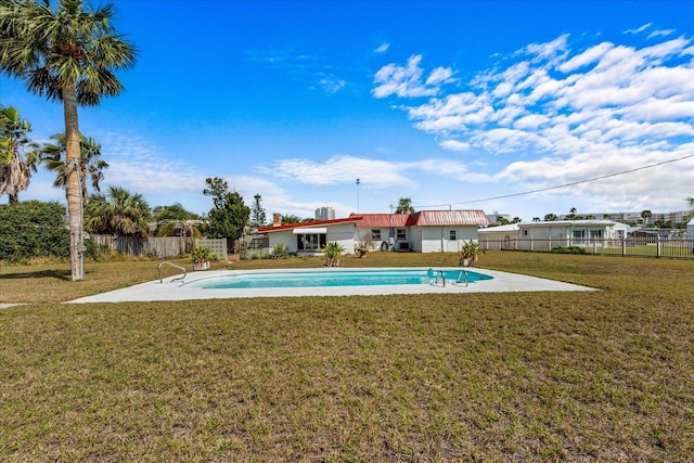 view of pool featuring a fenced in pool, a patio area, a yard, and fence