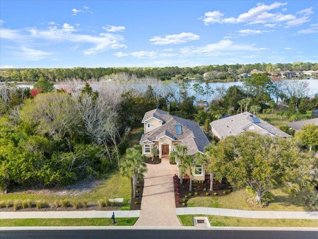 drone / aerial view with a water view