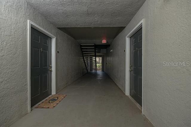 corridor featuring concrete floors