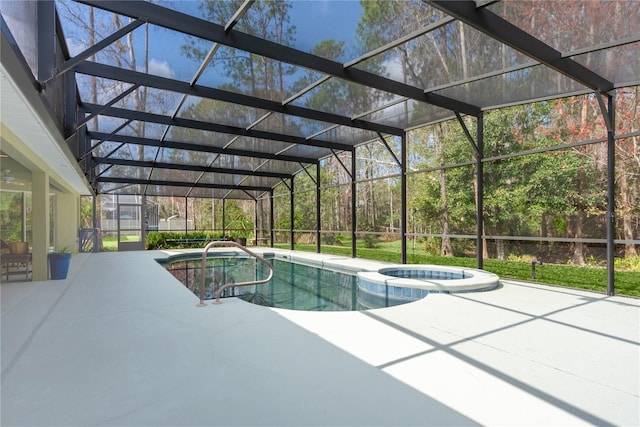 view of pool featuring a patio, a lanai, central AC, and an in ground hot tub