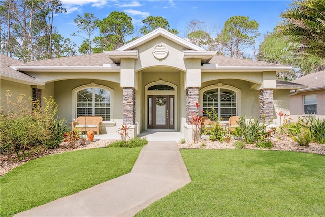 view of front facade with a front lawn