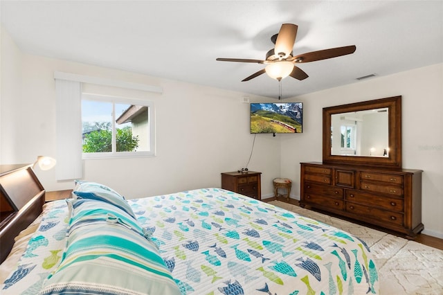 bedroom featuring ceiling fan