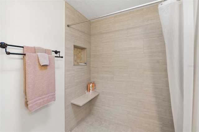 bathroom with a shower with curtain