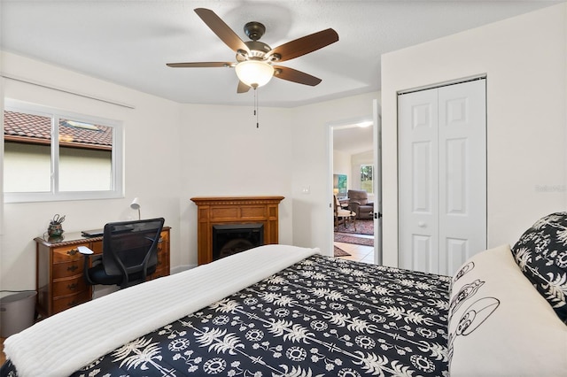 bedroom with a closet and ceiling fan