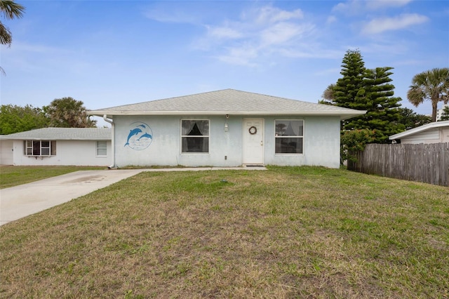 ranch-style house featuring a front lawn