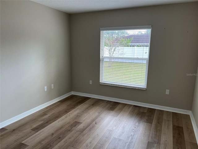 empty room featuring light hardwood / wood-style floors