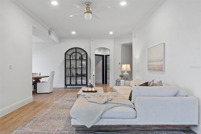 bedroom with crown molding and light wood-type flooring