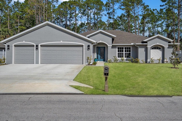 single story home with a garage and a front yard