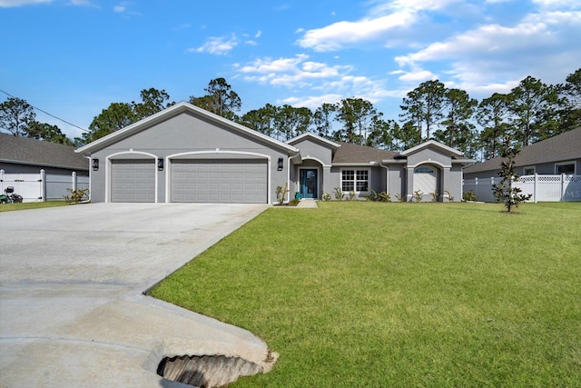 single story home featuring a garage and a front lawn