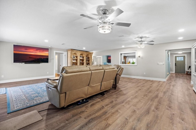 15 Cloverdale Ct S, Palm Coast, FL 32137 - living room featuring recessed lighting, ceiling fan, wood finished floors, and baseboards