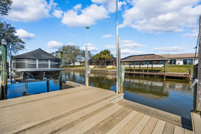 15 Cloverdale Ct S, Palm Coast, FL 32137 - dock featuring a water view and boat lift