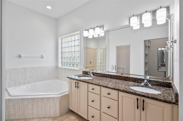 bathroom with vanity, separate shower and tub, and tile patterned flooring