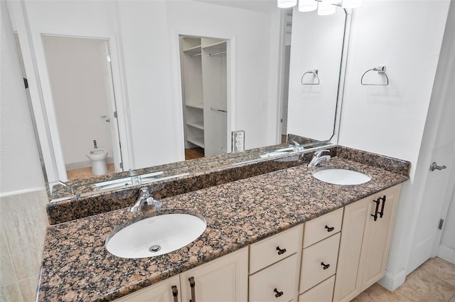 bathroom featuring vanity and tile patterned flooring