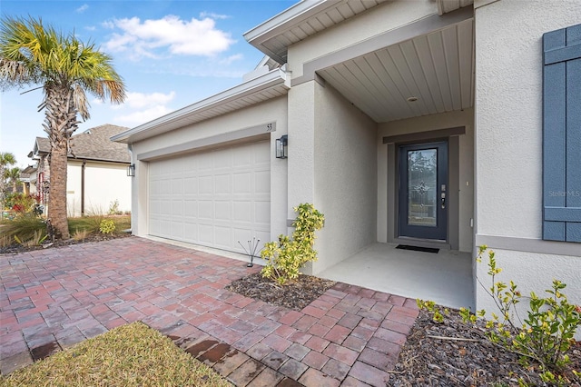 property entrance with a garage