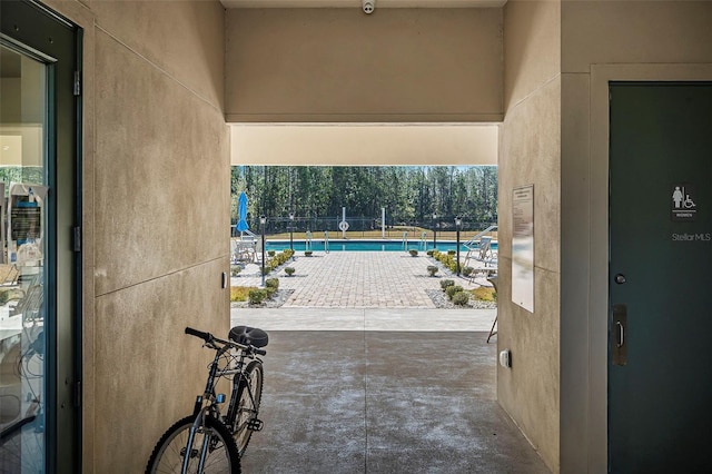 view of swimming pool with a patio