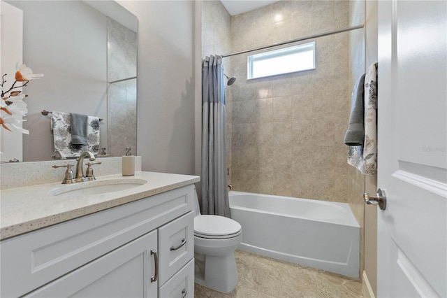 full bathroom with vanity, shower / tub combo, and toilet