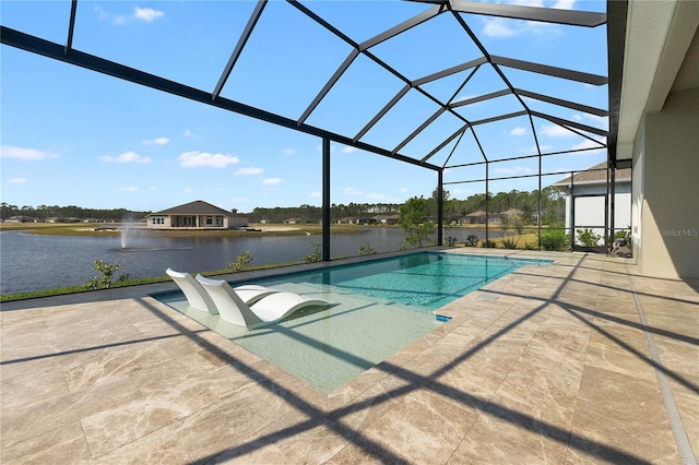 view of swimming pool with a patio area, a water view, and glass enclosure