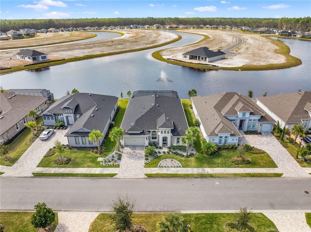 bird's eye view with a water view