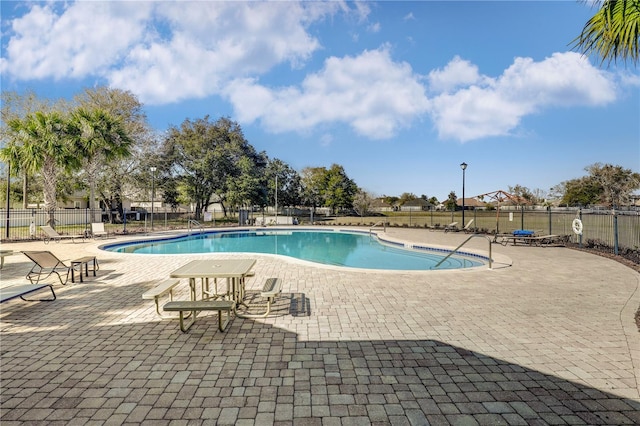 view of pool with a patio area