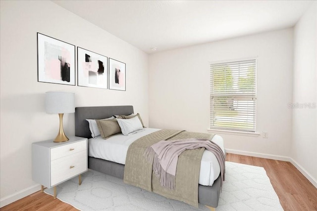 bedroom featuring light hardwood / wood-style floors