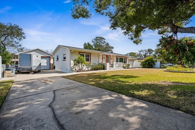 single story home featuring a porch and a front lawn