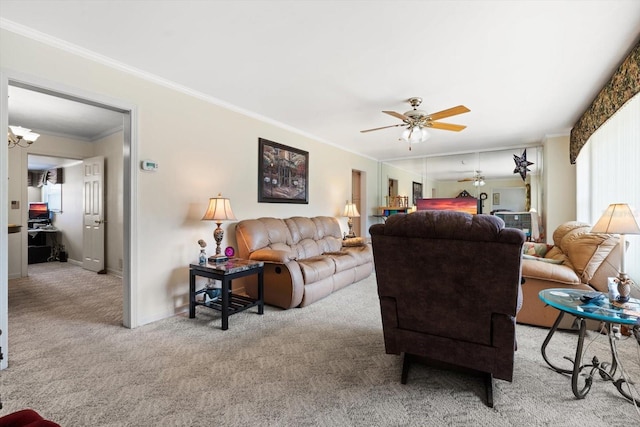 living room with crown molding, ceiling fan with notable chandelier, and light colored carpet