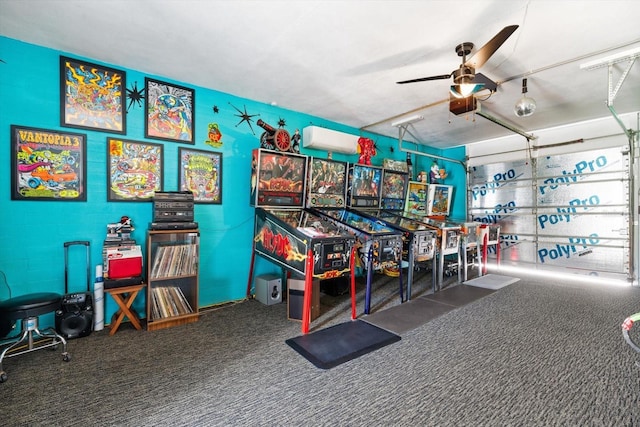 recreation room featuring ceiling fan, a wall mounted AC, and carpet