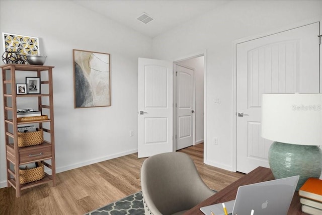 office area featuring hardwood / wood-style floors