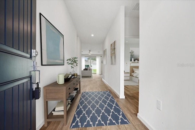 foyer with hardwood / wood-style floors