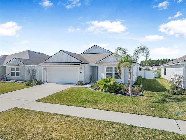 ranch-style home featuring a garage and a front lawn