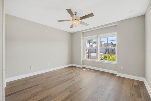 unfurnished room featuring wood-type flooring and ceiling fan