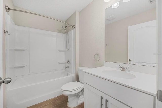 full bathroom featuring vanity, toilet, and bathing tub / shower combination