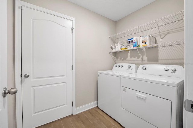 laundry room featuring washer and clothes dryer